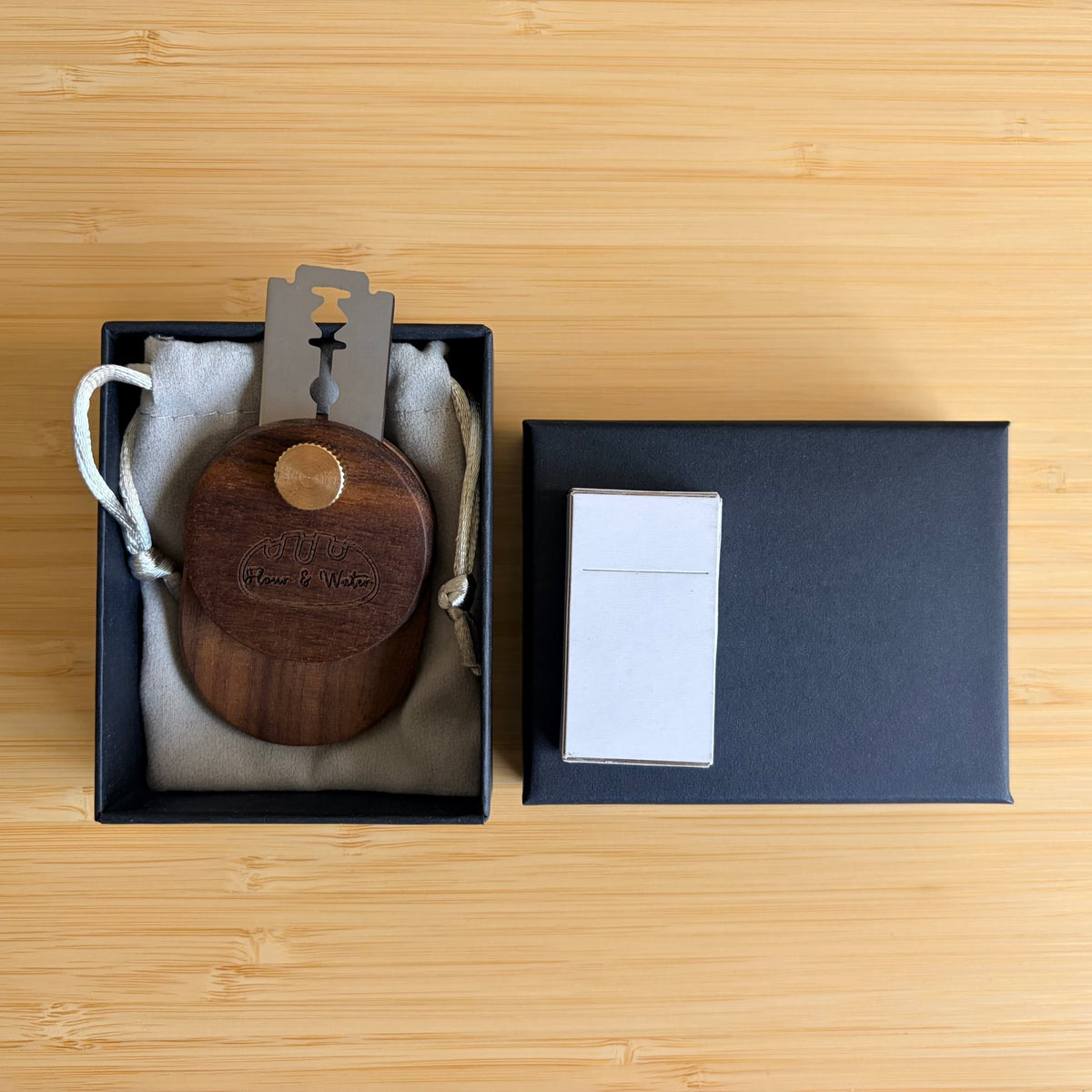 Walnut bread lame in black gift box with drawstring pouch and razor blades