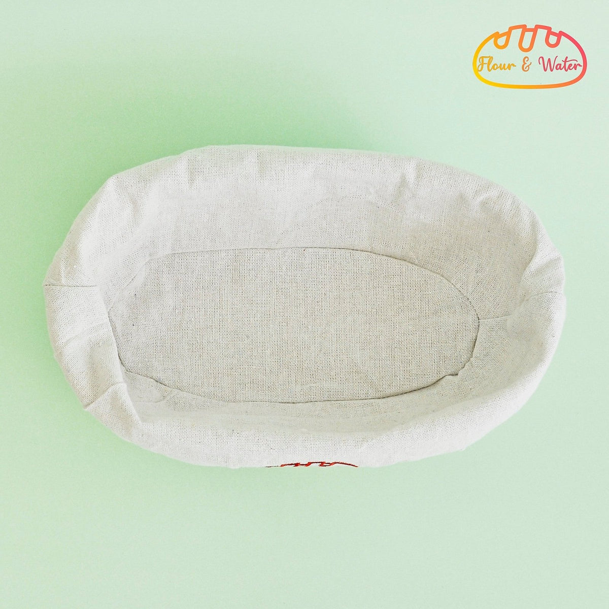 Oval banneton with cloth liner, top view