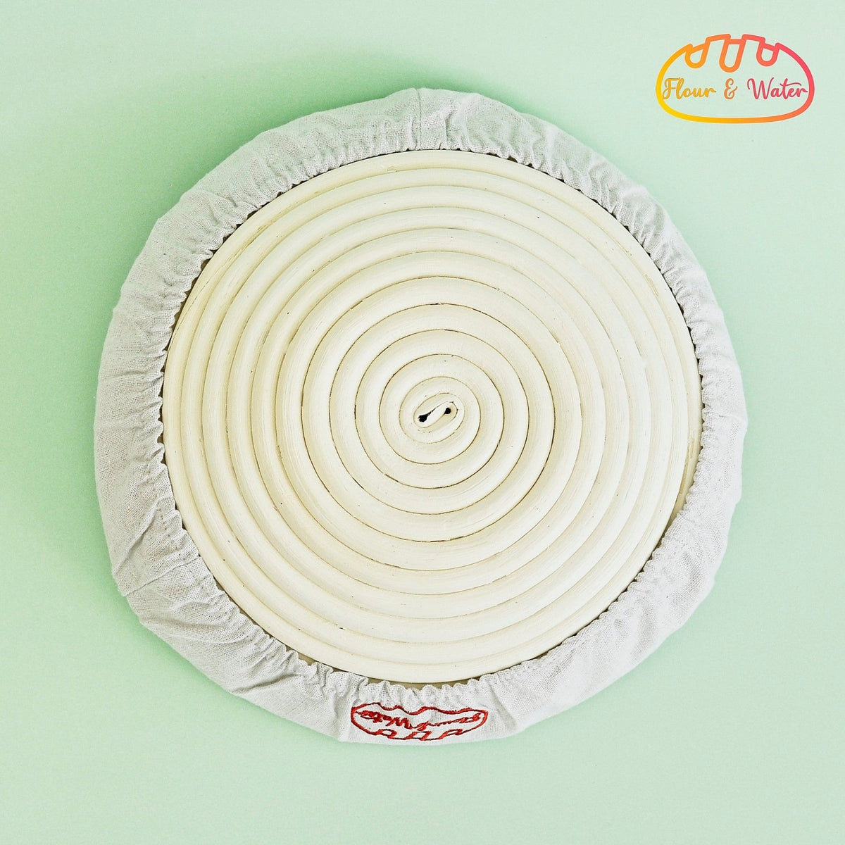 Round banneton upside down on its cloth liner
