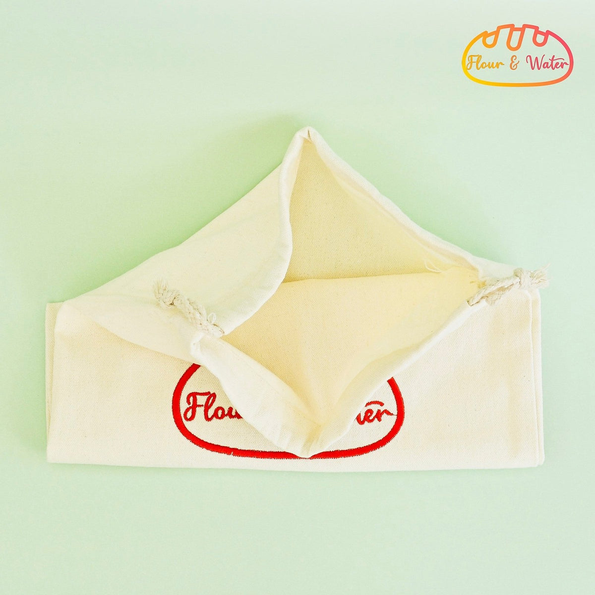 Canvas bread bag folded open to show the cotton lining