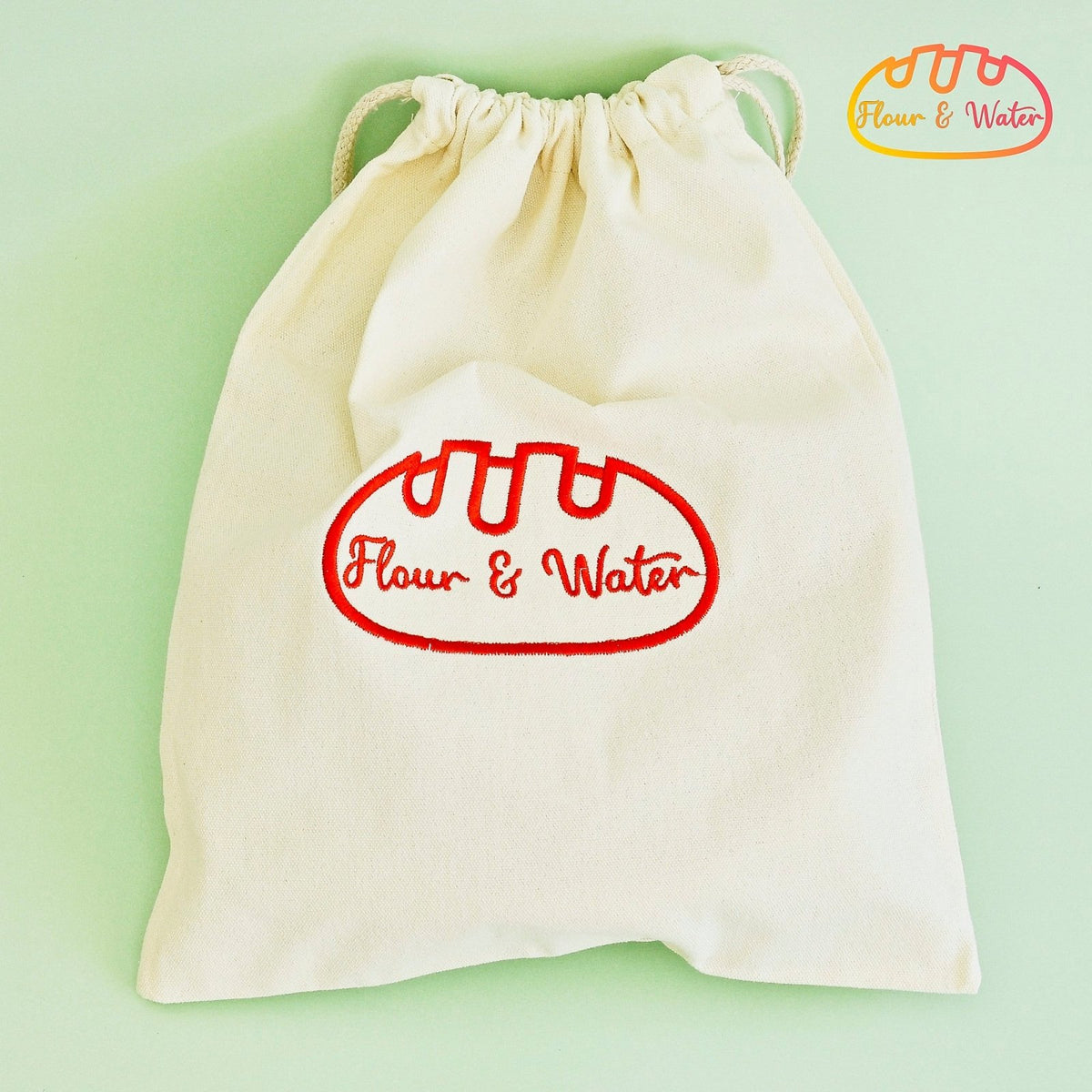 Cotton canvas bread bag with drawstring and Flour & Water logo