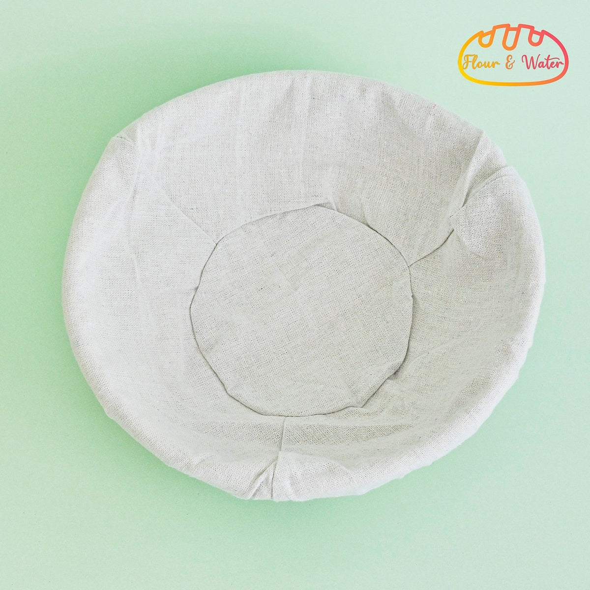 Cloth liner fitted inside a round banneton, top view