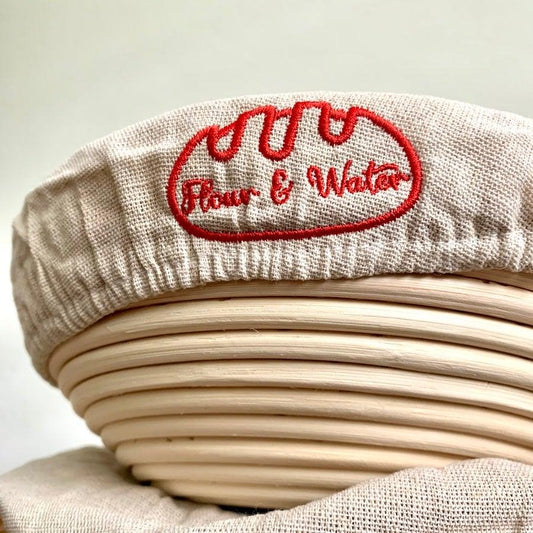 Linen cloth liner fitted inside a rattan banneton proofing basket