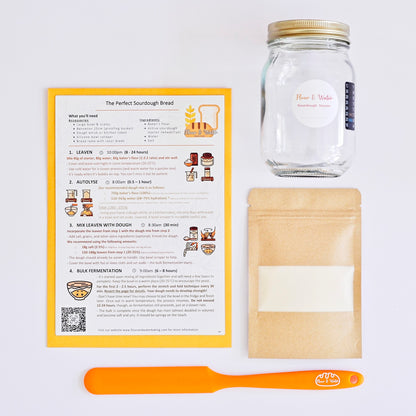 Bread-making kit with a jar, package, and recipe card on a white background