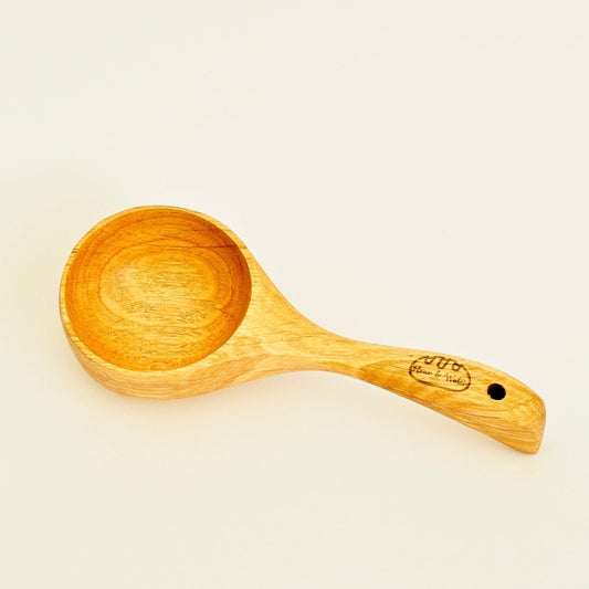 Round bamboo flour measuring scoop with carved logo
