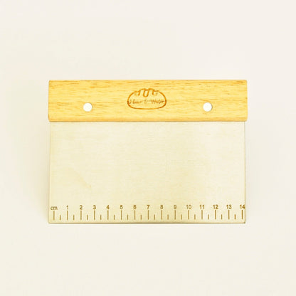 Stainless steel bench scraper with oak handle and ruler markings