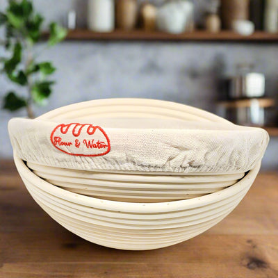 Two round bannetons stacked, one with a Flour & Water cloth liner